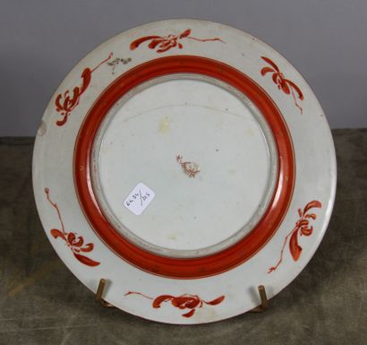 null Porcelain plate with red marli and gilt decoration, the center with branches...
