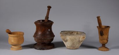 null Stone mortar and three natural wood mortars with their pestles

H : 12,5 - 22...