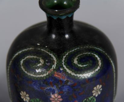 null A pair of cloisonné metal baluster vases with small necks decorated with flowers,...