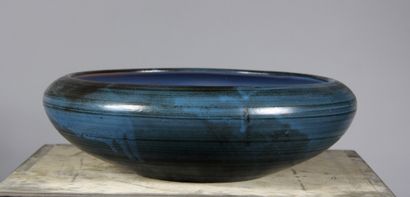 null Eugène GRANDJEAN-JOURDAN Vallauris

Grande coupe en céramique à glaçure bleu-gris...