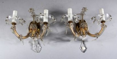 null A pair of gilt metal, glass and pampilles sconces with two arms of light

27...