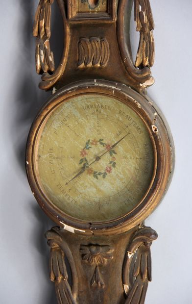 null Baromètre-thermomètre en bois sculpté redoré et laqué, XIXème s.

H : 94 cm....