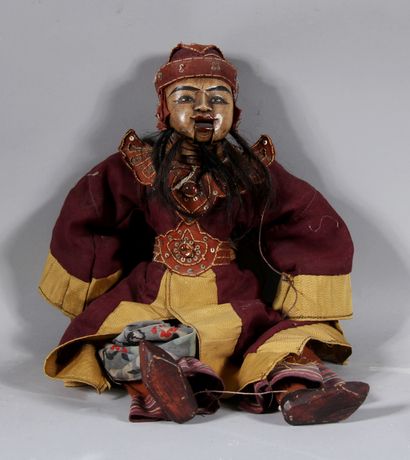 null Balinese puppet in polychrome wood

H : 57 cm.