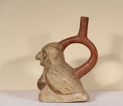 null Stirrup vase representing a man with a bird's head

Mochica culture, northern...