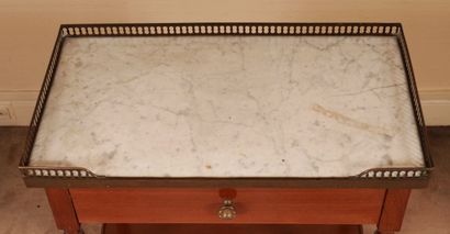 null Rectangular mahogany pedestal table, white marble top with openwork brass gallery,...