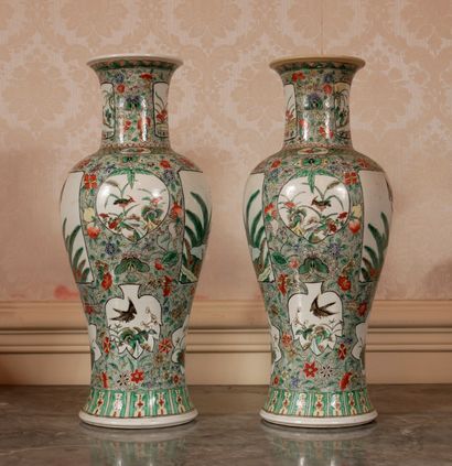 null Pair of polychrome porcelain baluster vases in the green family style (one damaged...