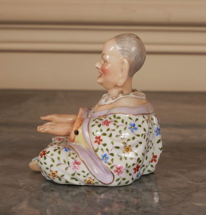 null Seated polychrome porcelain maggot with moving head and arms

H: 10 L: 11 c...