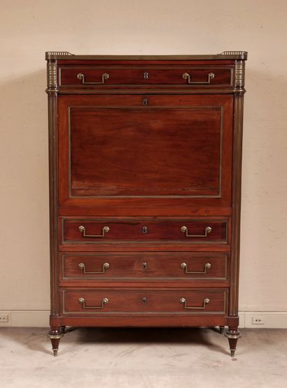 null Mahogany veneered desk with brass frames, grey veined marble top with openwork...