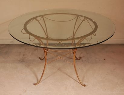 null Round dining table, four-legged gilded metal base, round bevelled glass top,...