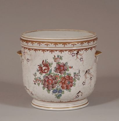 null A polychrome and gilded porcelain pot with handles decorated with a coat of...