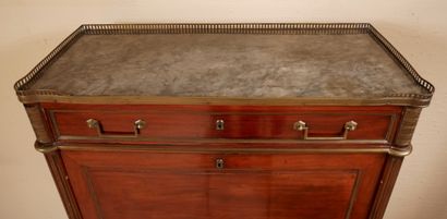 null Mahogany veneered desk with brass frames, grey veined marble top with openwork...