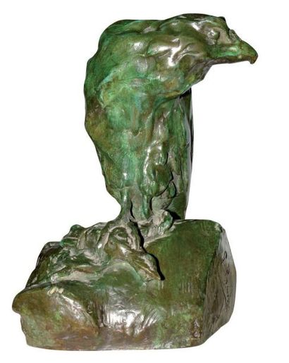 RIGHETTI Guido (1875-1958) Aigle perché sur un rocher tenant un oiseau dans ses serres...