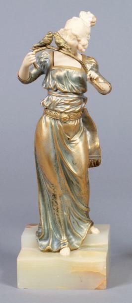 Georges OMERTH (1895-1925) « Les deux perruches ». Statuette chryséléphantine à tête,...