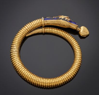 null *Bracelet tobogaz en or jaune 750 millièmes figurant un serpent enroulé, la...