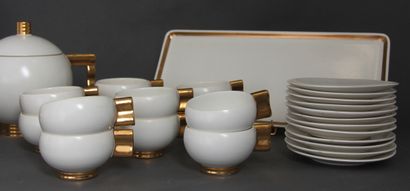 null ROBJ Paris

Cream and gold enamelled earthenware tea and cake set with wave...