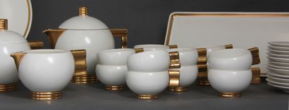  ROBJ Paris 
Cream and gold enamelled earthenware tea and cake set with wave handles...