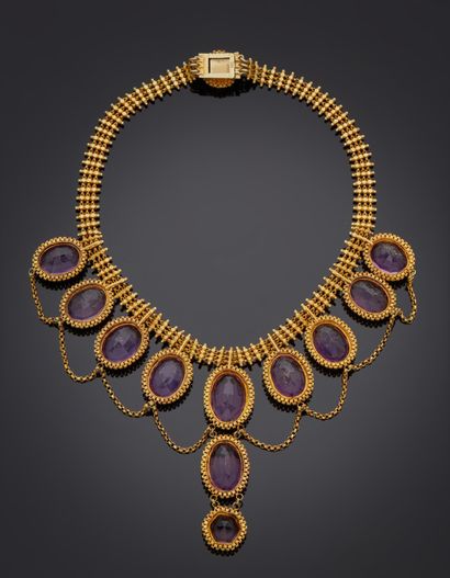 null Articulated necklace in yellow gold low title (ET), the center forming drapery...