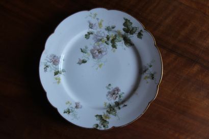 null W. GUERIN CO Limoges

Part of a white porcelain dinner service decorated with...