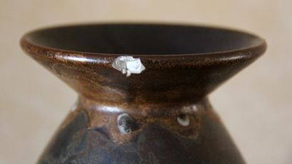 null KERAMIS

Pair of ovoid vases with open necks in stoneware enamelled in brown...