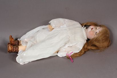 null Porcelain doll with open mouth, moving eyes and eyelids, composite body, made...