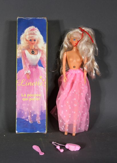 null Lot :

- a Barbie doll with its box

- 1 talking Linette doll with its box and...