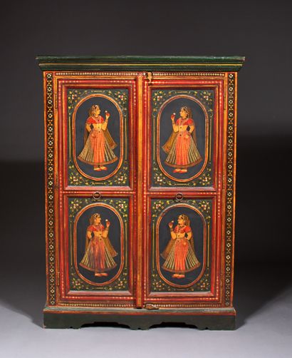 null Polychrome wood cabinet with two doors decorated with women in medallions, the...