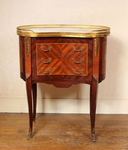 null Three drawer veneer table with marble top and openwork brass gallery, Transition...