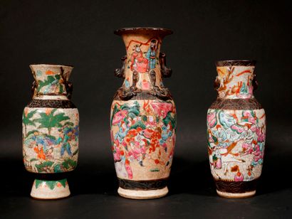 null Three cracked earthenware baluster vases with polychrome decoration of characters,...