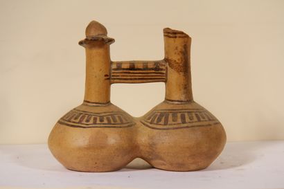 null Vase with double body decorated with a bird

Inca culture, Peru

Late period,...
