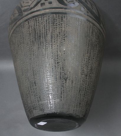null A transparent and frosted glass baluster vase engraved with vertical stripes...