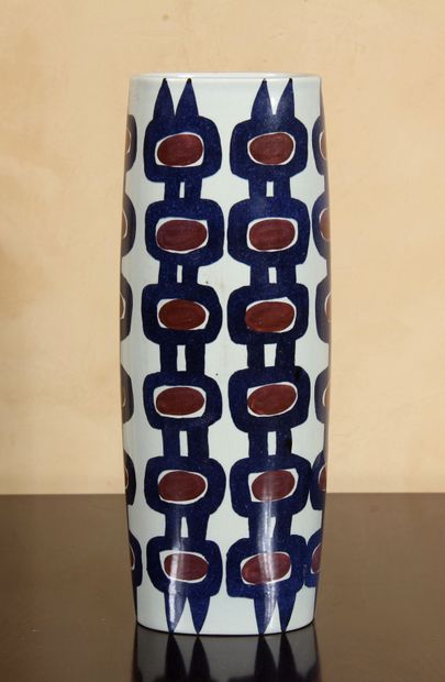 null ROYAL COPENHAGEN

A tubular porcelain vase decorated with blue vertical friezes...