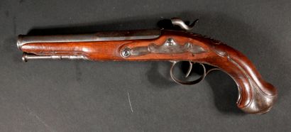 null Walnut percussion pistol, 19th century.

L : 30 cm.