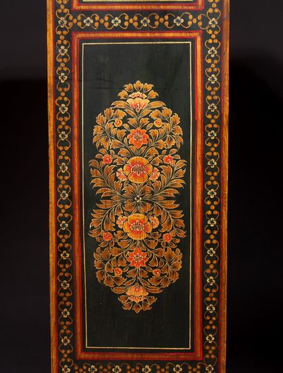 null Polychrome wood cabinet with two doors decorated with women in medallions, the...
