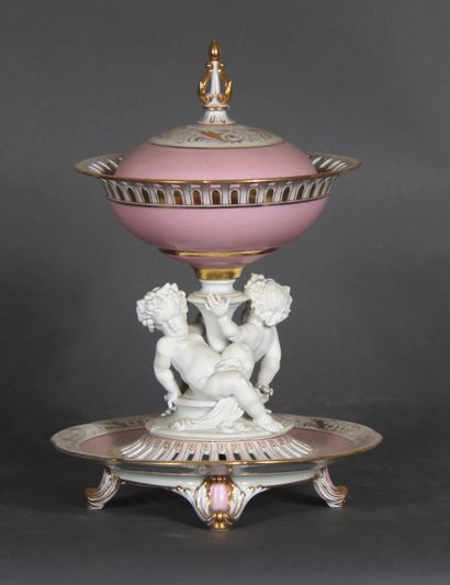 null Four-legged display stand with two openwork trays covered in white porcelain...