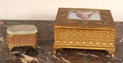 null Four-legged brass jewellery box decorated on the lid with a portrait of a woman...