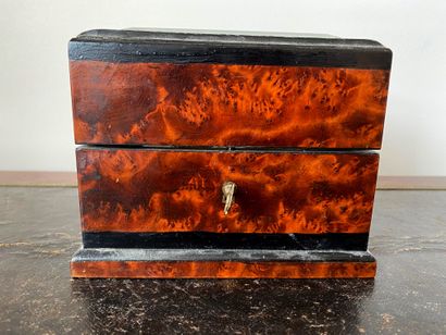 null Perfume box in burl veneer and blackened wood, the lid decorated with a faceted...