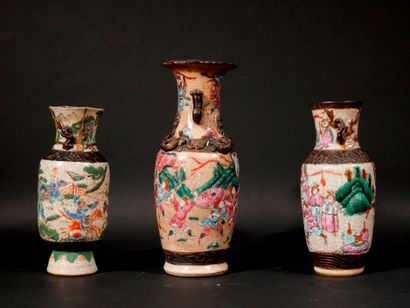 null Three cracked earthenware baluster vases with polychrome decoration of characters,...