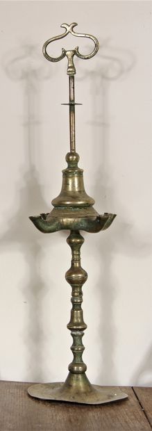null Two hanukiahs and a bronze oil lamp

H: 20-22 and 58 cm.