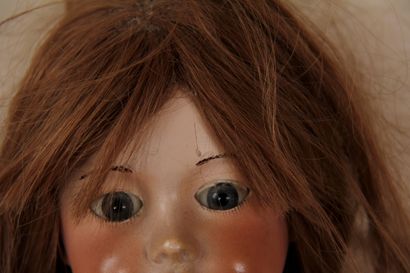 null SFBJ 301 porcelain head doll, composite body

H : 57 cm. (accidents to the ...