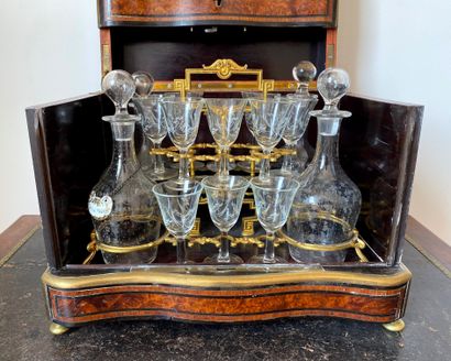 null A burl veneer, ebony and brass marquetry liquor cabinet, Napoleon III period

H...