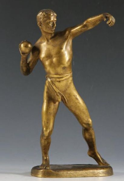 Paris,1924 Louis TAUZIN Le Lanceur de poids Sculpture. Epreuve en bronze doré signé...