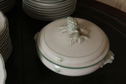 null Part of a round porcelain dinner service, white with green edging decorated...