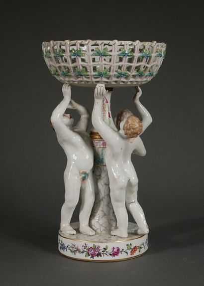 null *MEISSEN

Polychrome porcelain display stand decorated with three putti supporting...