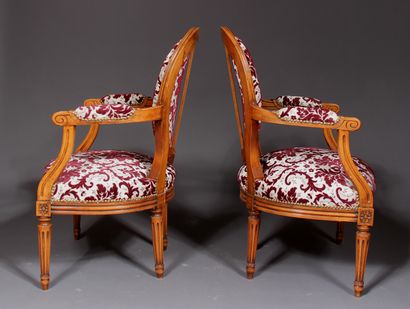 null 
*A pair of Louis XVI style natural wood medallion back cabriolet armchairs...