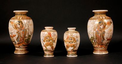null Two pairs of earthenware baluster vases with polychrome and gilt decoration...