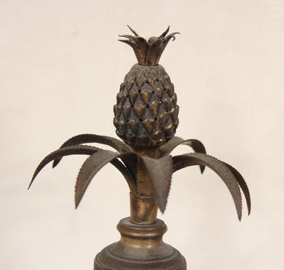 null A bronze and brass quadripod toothpick stand in the form of a vase on a pedestal...