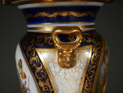 null Baluster vase on pedestal in polychrome and gilded porcelain decorated in medallions...