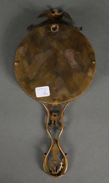 null Bronze and brass hand mirror with an eagle on top, Empire style

H : 27,5 cm....