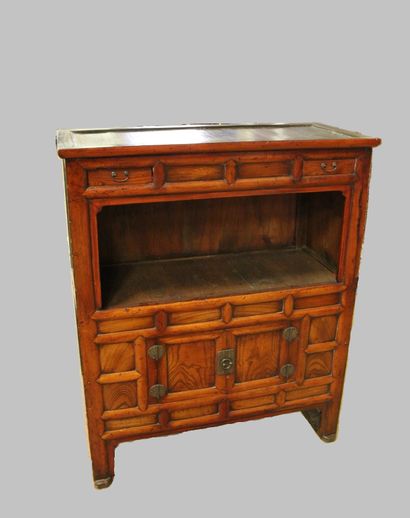 null A zelkova and pine wood cabinet, with a light patina, two levels on four feet,...