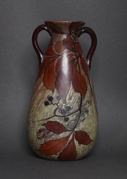 null LEGRAS

White enamelled glass baluster vase with painted autumn foliage, two...